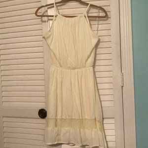 Cream sundress with polka dot mesh detail